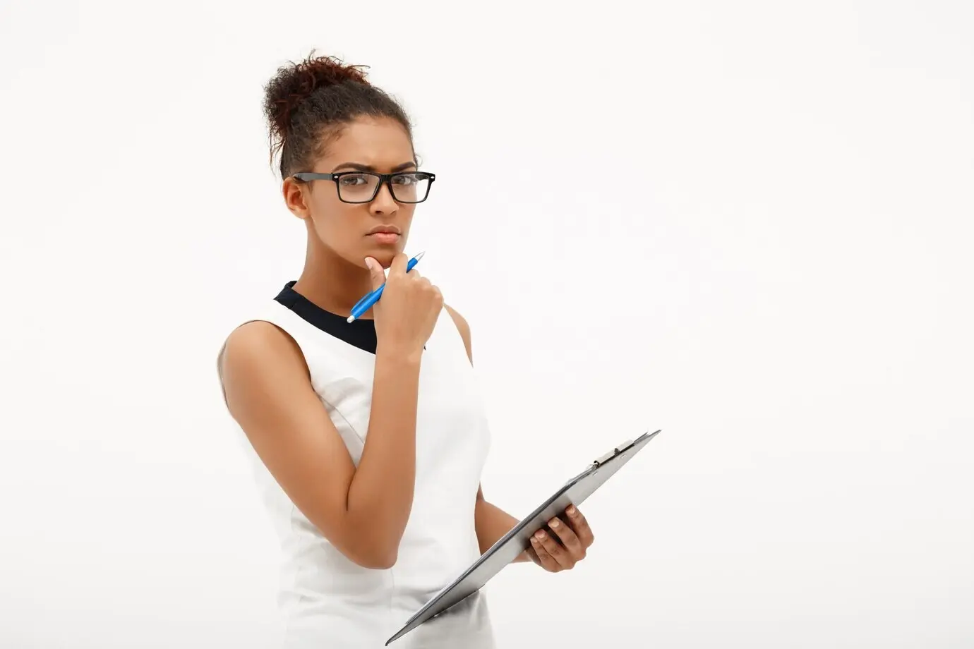 Portrait of a young, successful African businesswoman on a white background